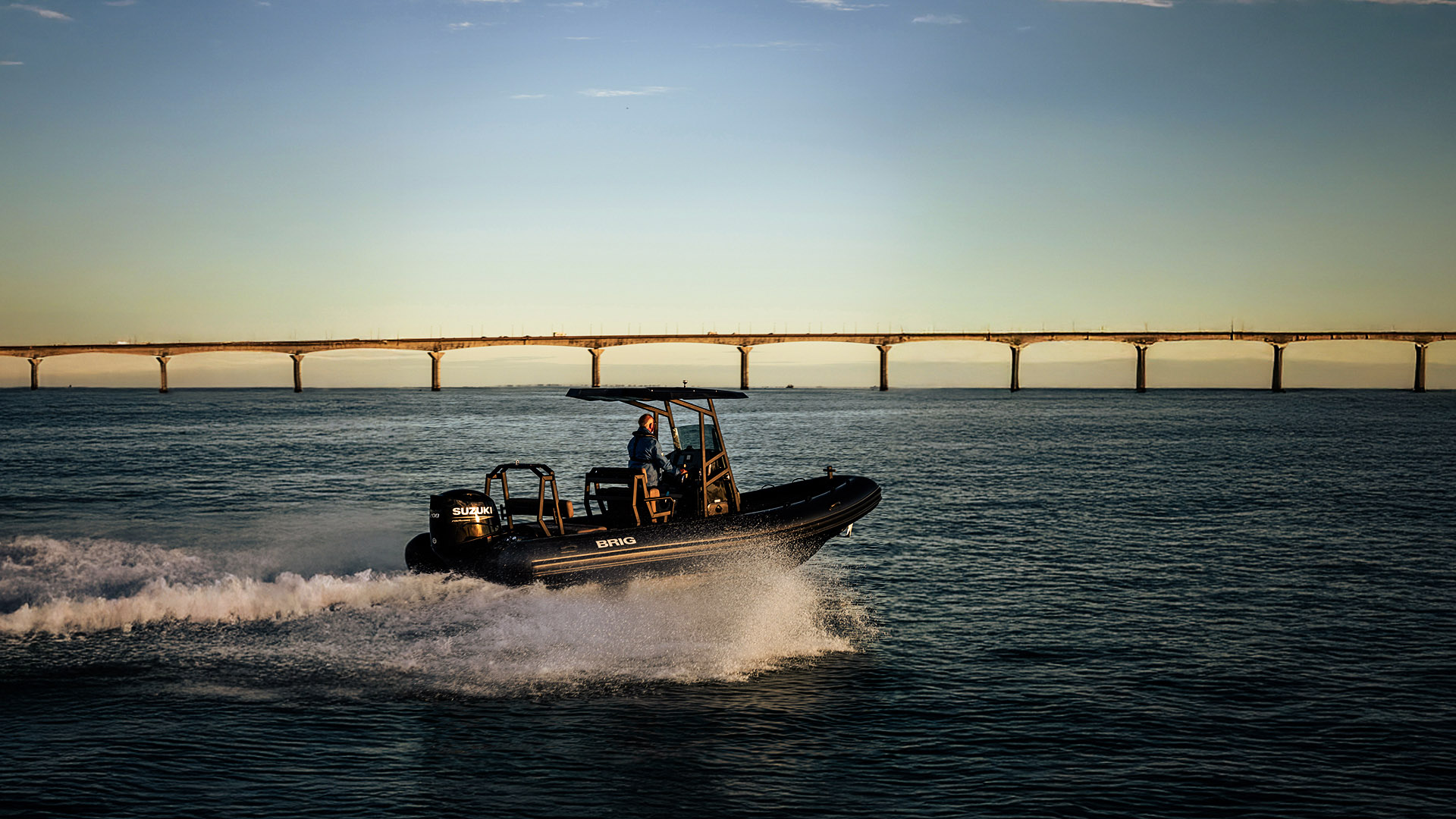 BRIG RIB with deep-V hull running through open-water chop